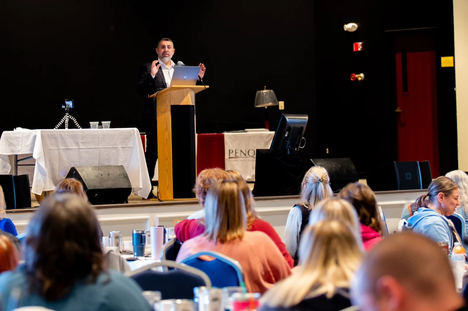 Romeo El Chaer speaking at a live leadership event